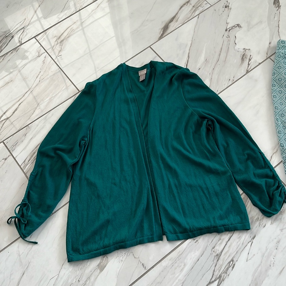 Lightweight cardigan sweater with ankle length pants.
